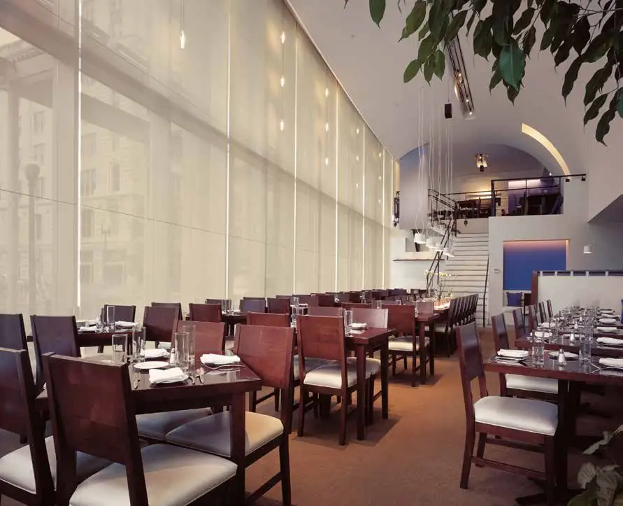 Restaurant with motorized shades