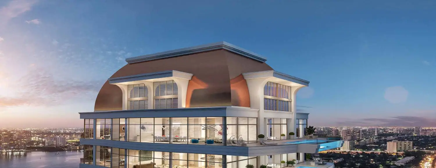 Luxury waterfront residential tower with rooftop amenities at sunset