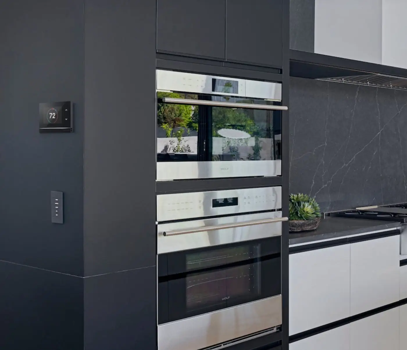 Modern kitchen with a wall-mounted control keypad